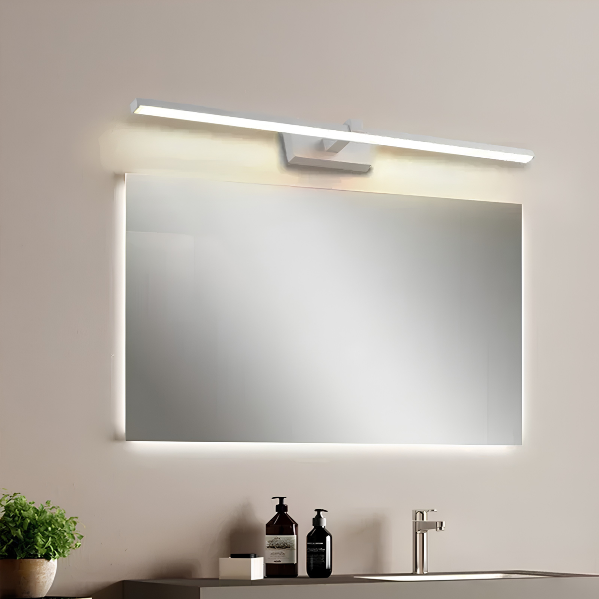 Matte white LED vanity bar light above a backlit halo-effect mirror in a warm, minimalist bathroom.