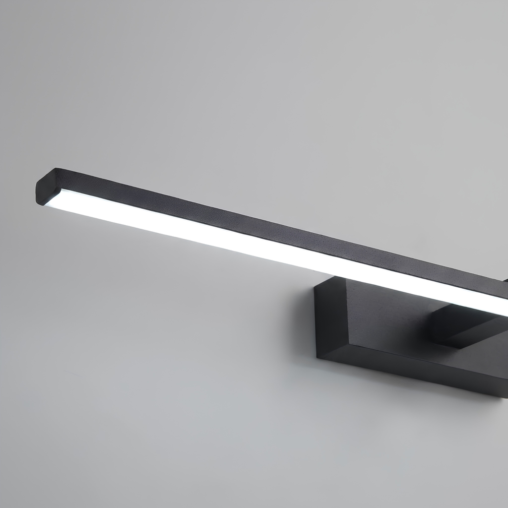 Close-up macro shot of the matte black aluminium edge and frosted diffuser lens of an LED vanity bar light.